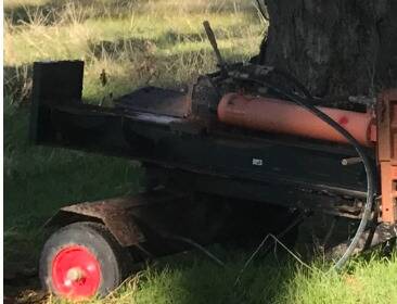 THEFTS: The log wood splitter was taken from a paddock in Greens Creek. Picture: CONTRIBUTED