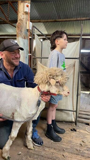 TRIM: Archie and his sheep with their new haircuts. Picture: CONTRIBUTED