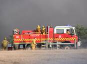 Firefighters at the scene of a blaze in Dereel. Picture by Kate Healy. 