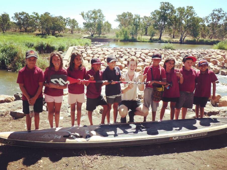 Tom Dunn with year five students at Brewarrina.