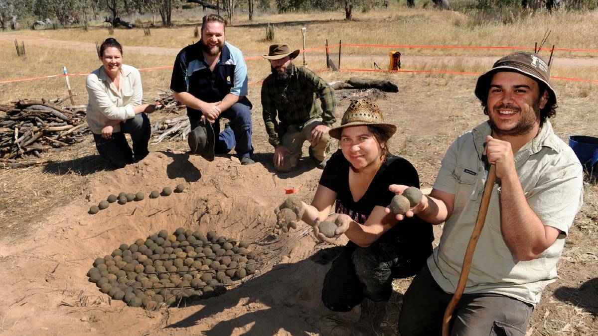 Flinders University architect Abby Cooper, Barengi Gadjin Land Council architect Darren Griffin, LaTrobe University PhD student Maurizio Campanelli, tradition land owner Tracey Rigney and LaTrobe University student Daniel Clarke with a re-created traditional Aboriginal earth oven in 2015. Picture: SAMANTHA CAMARRI