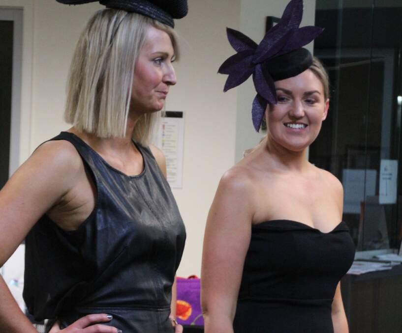 RUNWAY: Model millinery by Annie Mac during the parade.