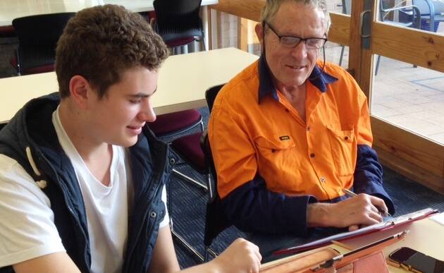 TAILORED SESSION: Jack Rutter and Stephen Ware at one of the device advice tutorials organised by Stawell Library. Picture: CONTRIBUTED