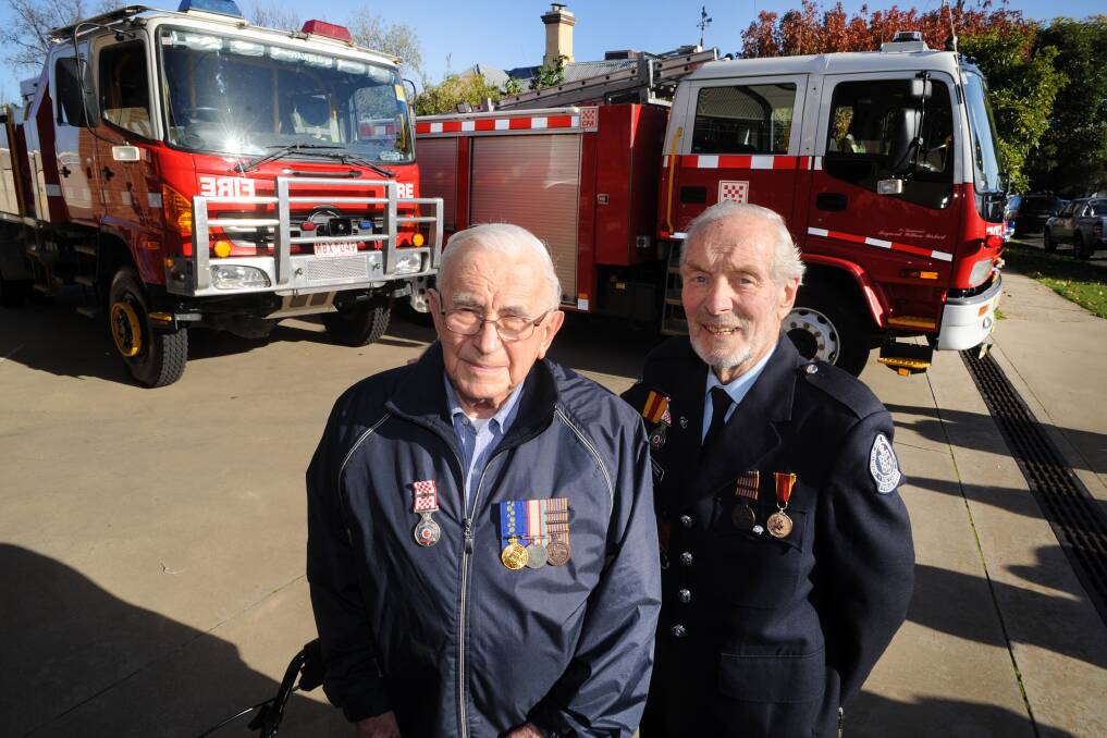 RARE HONOUR: Neil Bennett and Ray Rickard had trucks named after them as part of Stawell Fire Brigade's 150th anniversary celebrations. Picture: PAUL CARRACHER