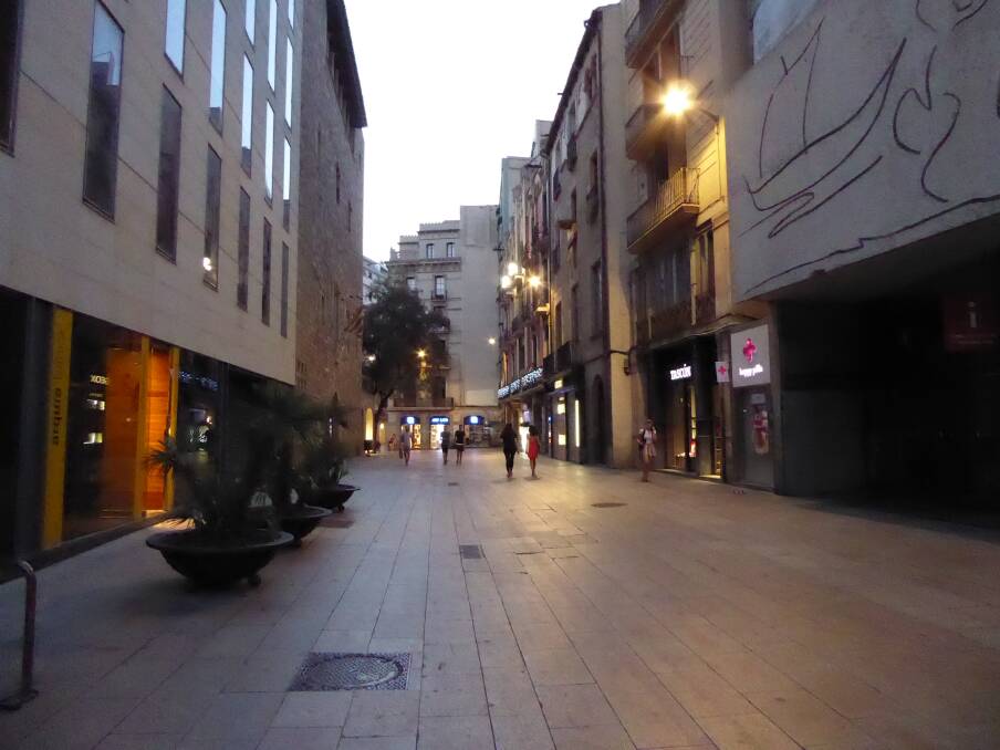 People started running down this street in Barcelona, about 500 metres away from where the attacks took place. Picture: CASS DALGLEISH