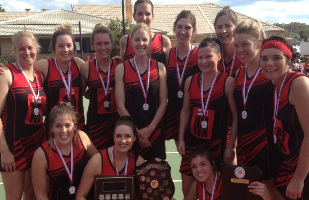 SUCCESS: Members of Wedderburn's winning A and B-grade netball teams on Saturday with the spoils of victory. Picture: CONTRIBUTED