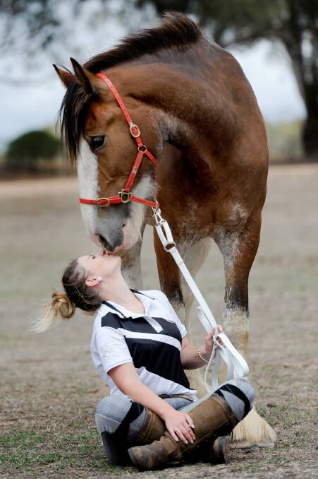 WELL DONE: Ashlee Blight gives Hamish a kiss for his efforts. Picture: SAMANTHA CAMARRI   