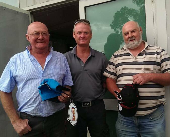 CHAMPIONS: Summer four-ball winners Rob Blachford (left) and David Hooper (right) are congratulated by Phil Matthews from Deep Core Drilling, sponsor of the Stawell Golf Club event. Picture: CONTRIBUTED 