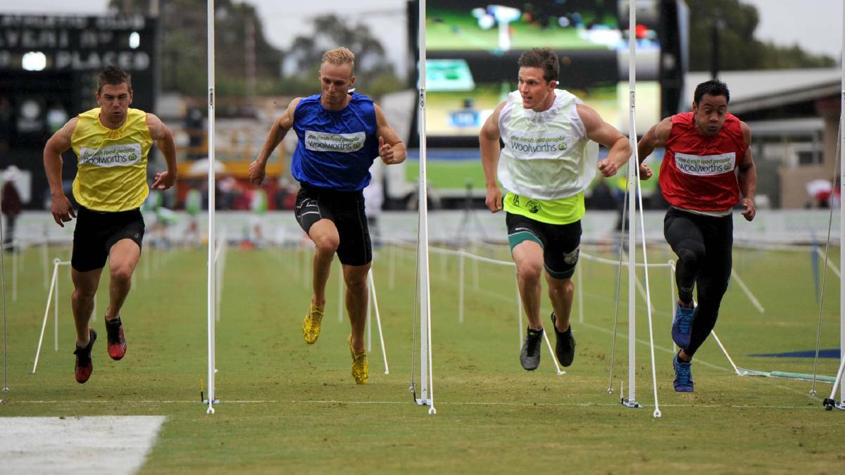 FINISH: Murray Goodwin, second from right, at the 2015 Stawell Gift.