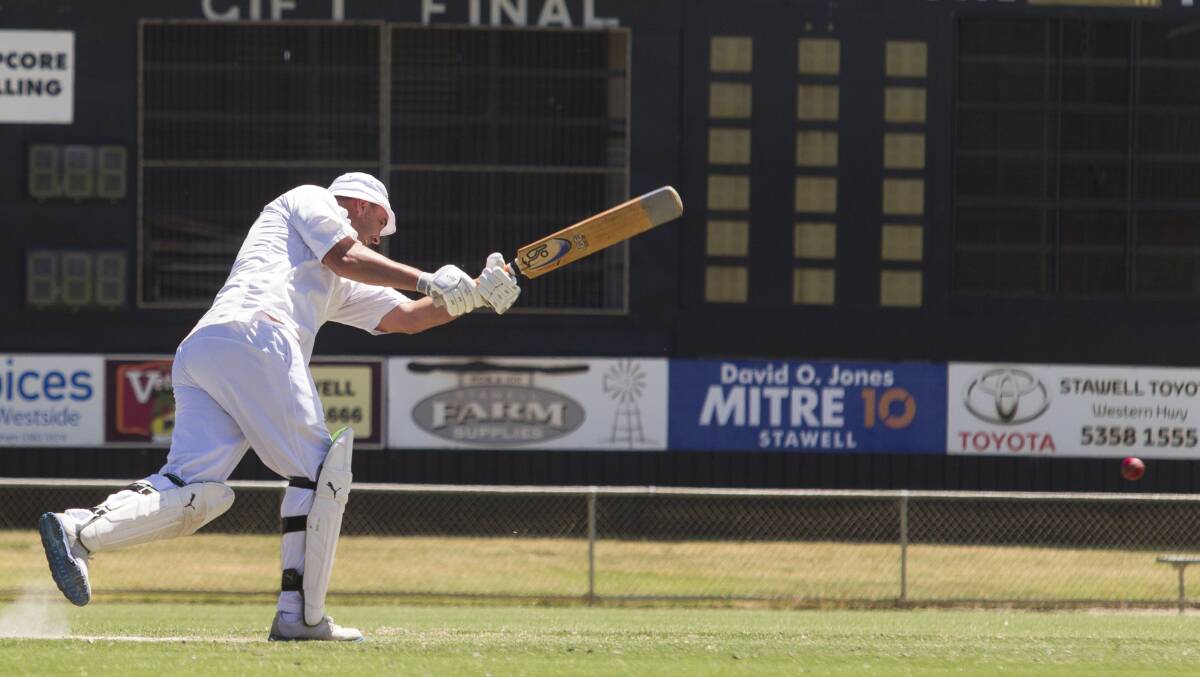 Foot work: Aradale's Scott Turner dances down the pitch against Swifts-Great Western on Saturday. Aradale batted for a full day but were unable to chase the Combine's score.