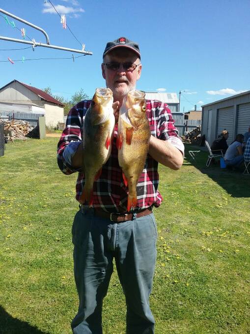 Porud: Ray Howard shows off the two red fin he caught in the last Stawell and District Angling Club Run.
