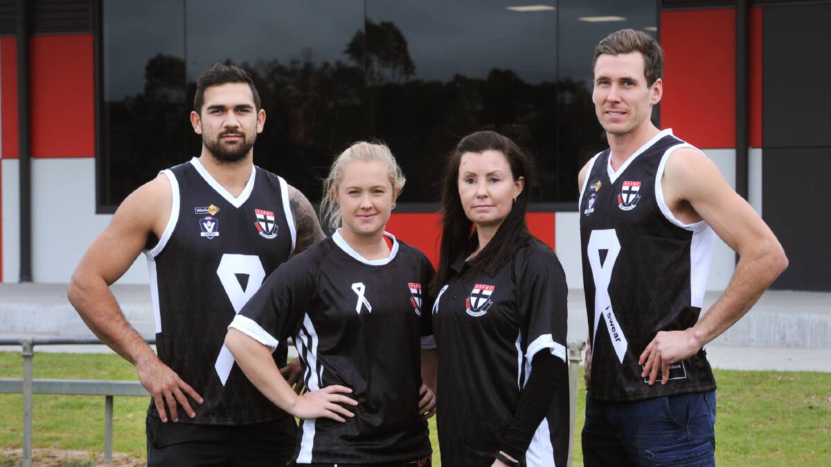 Models: Jacob Cooke-Harrison, Shannon Reinheimer, Simone O'Brien and Alex McRae with White Ribbon jumpers Horsham Saints will wear on Saturday. Picture: Paul Carracher