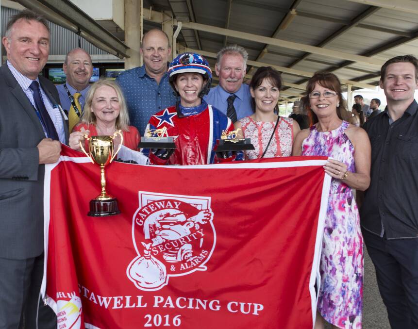 Front and Centre: Kerryn Manning is joined by the winning connections following the Stawell Pacing Cup. Picture: Peter Pickering