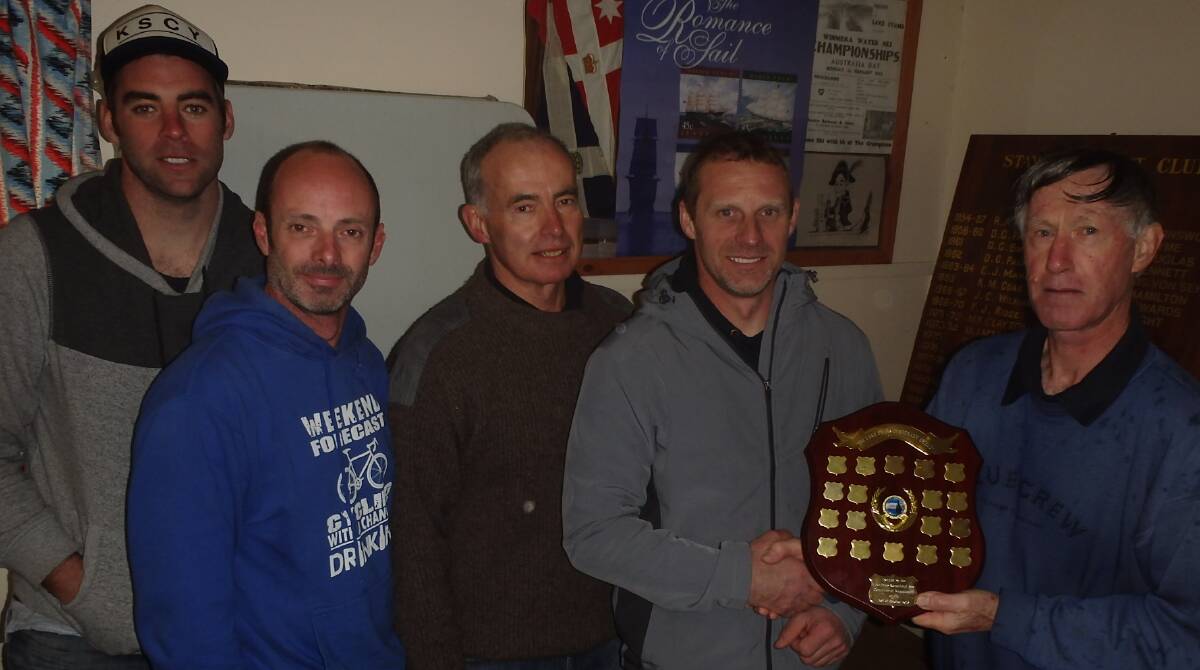 Vicitors: Ballarat sailors Jason Hegert, Rohan Allen, Peter Coburn and BYC Commodore Neville Bilney are congratulated by SYC Commodore Roger Spratt.