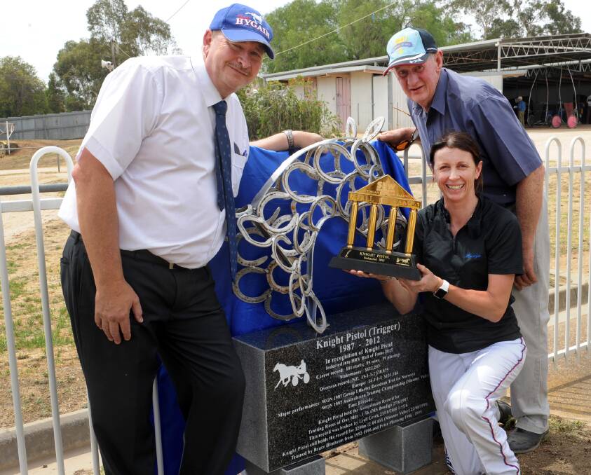 Legend: Geoff Sanderson, Kerryn Manning and Peter Manning unveil the Knight Pistol Hall Of Fame Memorial at Stawell Harness Racing Club's 60th anniversary meeting on Australia Day.
