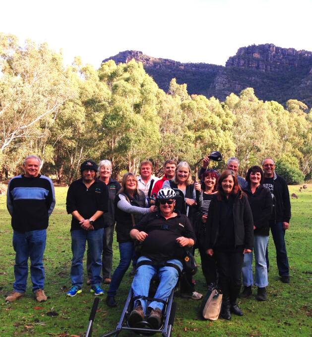 New wheels: Members of the Smith family join with volunteers from the Halls Gap community in welcoming the arrival of a new TrailRider.