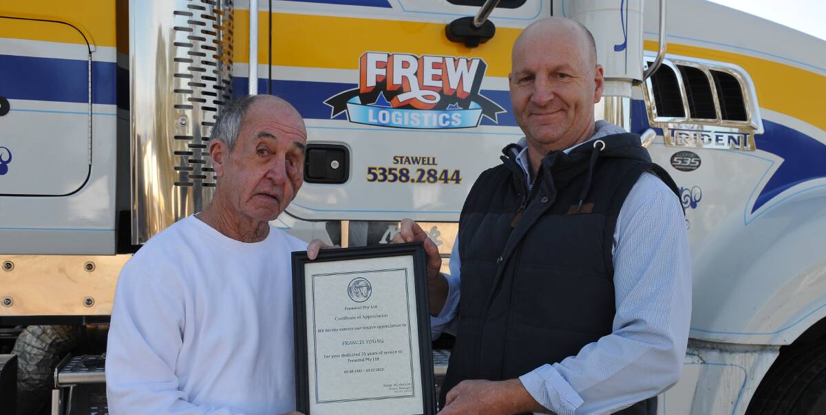 Dedicated: Frank Young receives a certificate of appreciation for his 34 years of dedicated service from Frewstal General Manager Greg Nicholls. Picture: Marcus Marrow.