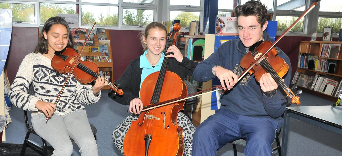 RIGHT NOTE: Maya Hodge, Elspeth Lawson and Carey Foley enjoy some valuable practice ready for the Wimmera Bands School at Stawell.