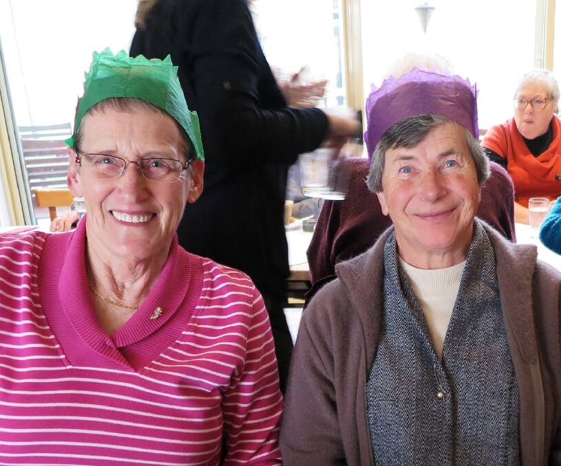 CRACKER: Mavis Evans and Eva Fisher enjoyed a lovely meal as part of the Christmas in July event. 