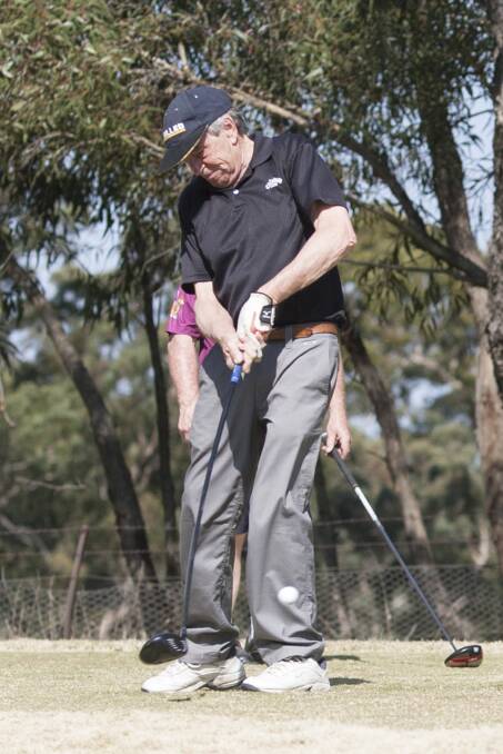 BALANCED: Ken Hurnall takes his shot during a previous event at Chalambar Golf Club. Picture: Peter Pickering