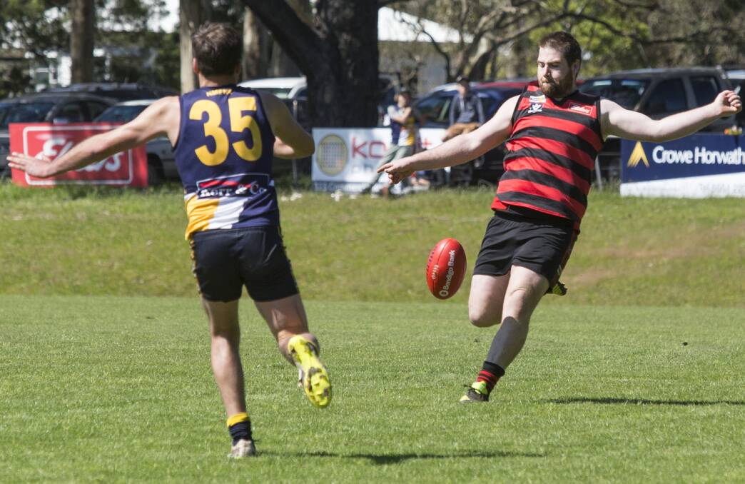 GOING LONG: Penshurst's Nick Sherlock looking for a goal during the 2016 reserves grand final. Picture: Peter Pickering