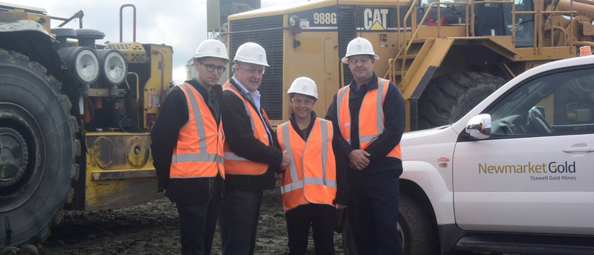 DONE DEAL: (From left) Phillip Urquijo, Murray Emerson, Jaala Pulford and Troy Cole at the Stawell Gold Mine.