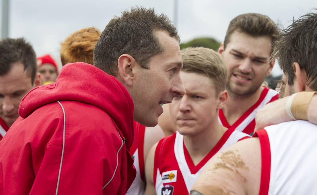 Rats coach Mick Fratin talks to his team during a break earlier in the season. Picture: Peter Pickering