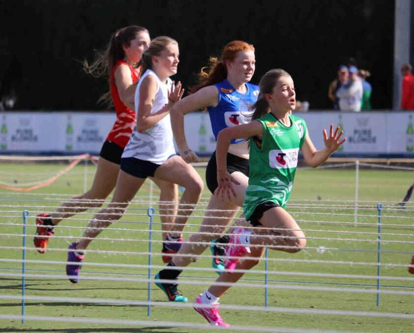 CHAMPION: Ringwood's Emma Driscoll leads the other runners during the little athletics 100m handicap. Driscoll is the third generation of her family to compete at the Stawell Gift. Picture: Little Athletics Victoria