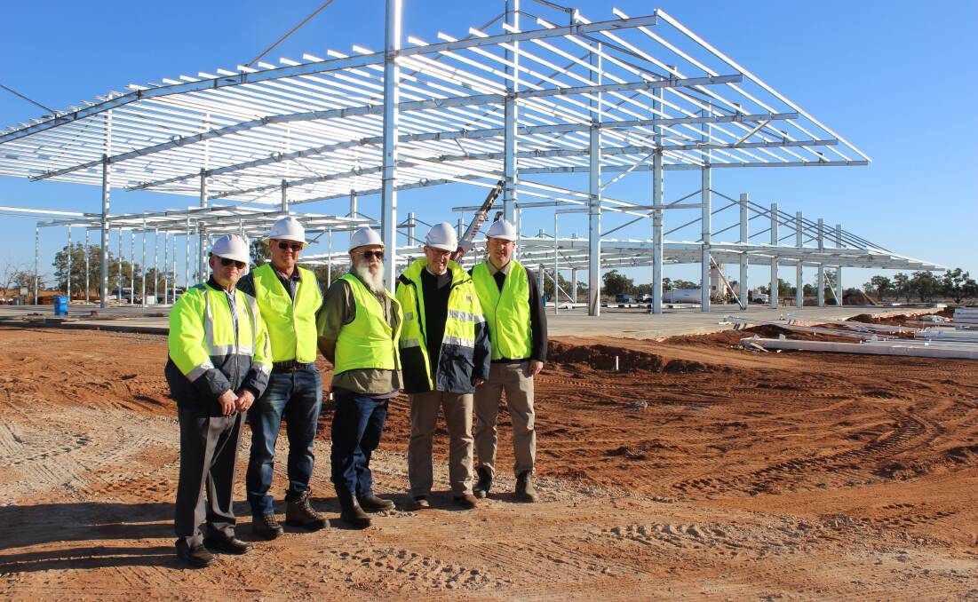 Parkes MP Mark Coulton, second from right, at the starts of works on the Bourke small animal abattoir in 2017.