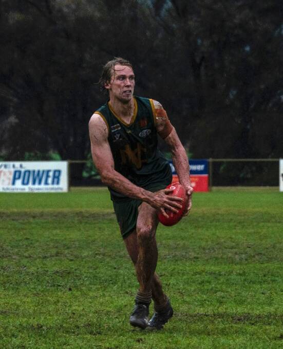 OPTIONS: Senior footballer Josh Fowkes looks downfield for a team mate. Picture: CONTRIBUTED