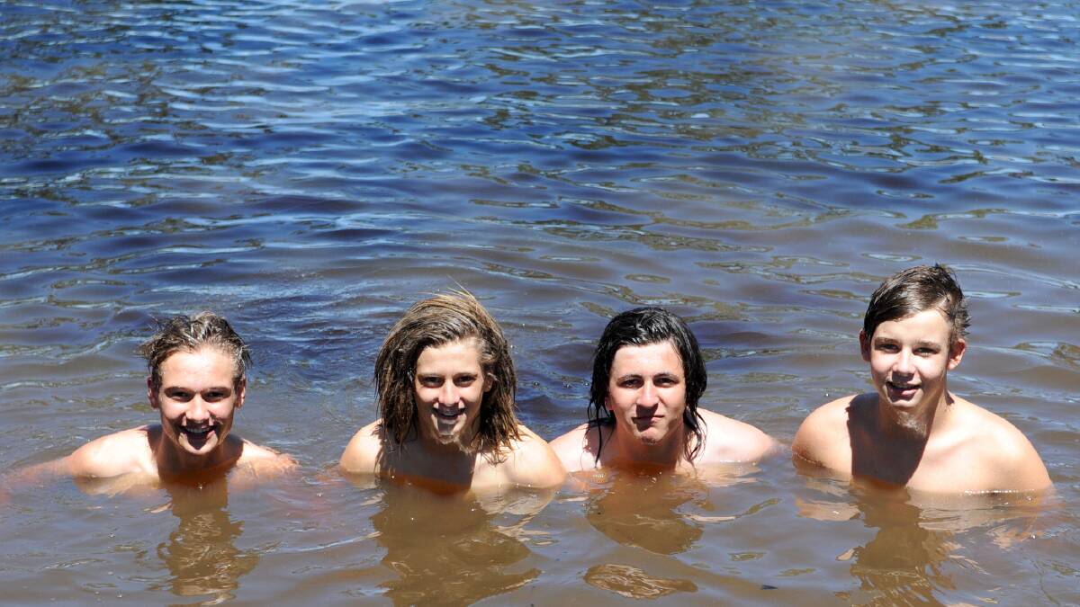 Benson Miller, Matt Wynne, Harry Robertson and Nick Pizzoni from Horsham enjoying the Wimmera River in the summer.