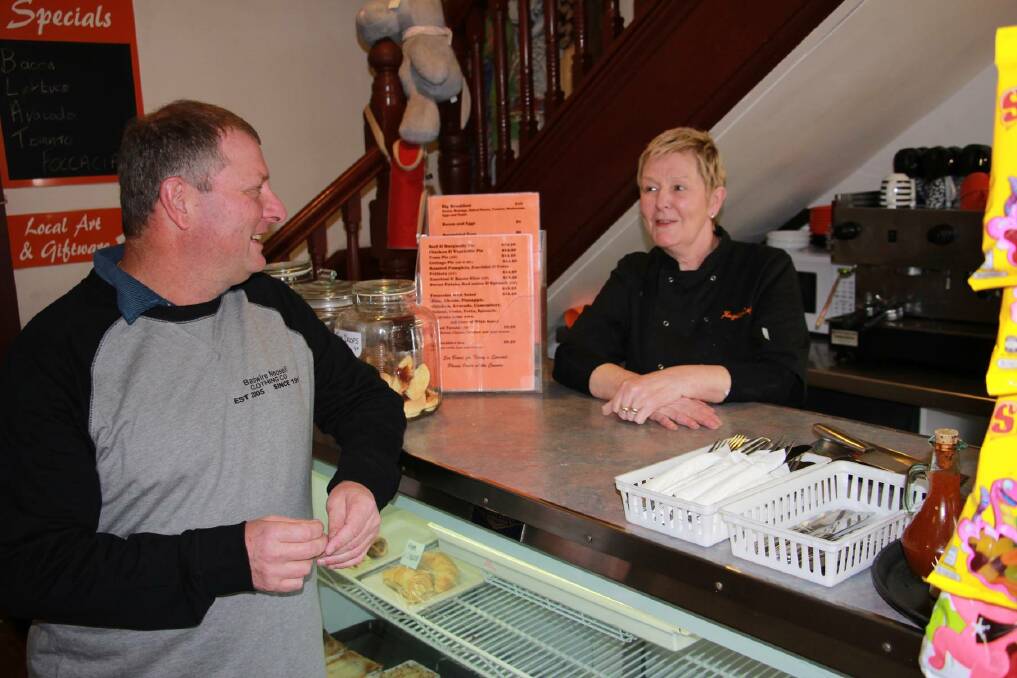 Damian Ferrari speaks with Beaufort Café owner Sheina Owen. Picture: CONTRIBUTED