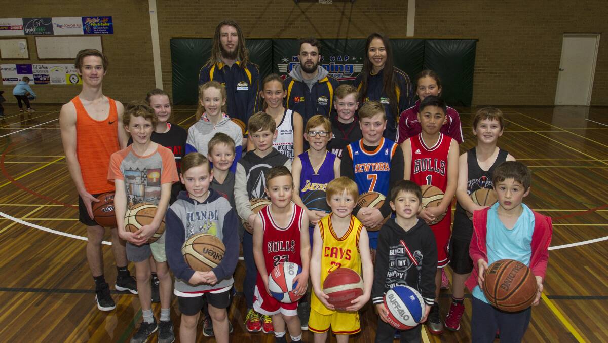 ALL SMILES: Craig Moller, Peter Hooley and Joy Burke at the Stawell basketball clinic. Picture: Peter Pickering. 