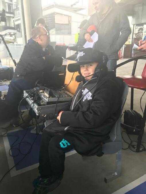 HAVING A BLAST: Picture: Ethan joins the TAC Cup Radio team. He was a former Ronald McDonald House resident. Picture: Contributed. 