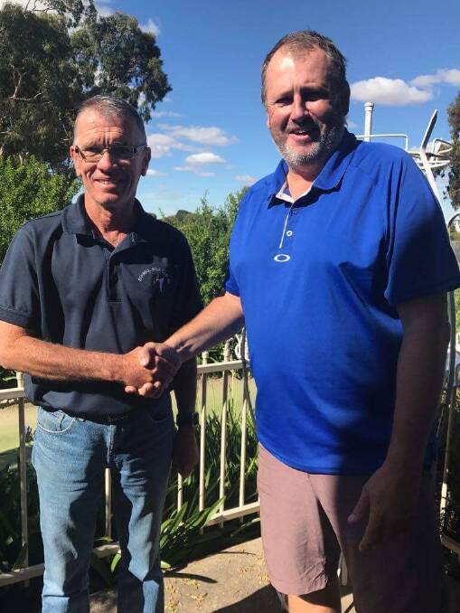 CONSISTENCY REWARDED: 2017 Stawell Windows and Glass Cup winner Max Waters with Stawell Golf Club men's captain Richard Hackwill. Picture: Contributed.