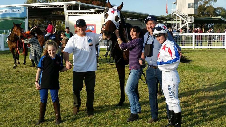 ON FIRE: Jockey Jessica Eaton and the team for Marocco Road after winning at Donald. The win was Eaton's third in as many weeks. Picture: Penny Penfold. 