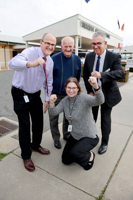 RAPT: Don McRae, Don Johns, Mark Knights and Amelia Crafter celebrate yesterday's funding announcement. Picture: Samantha Camarri