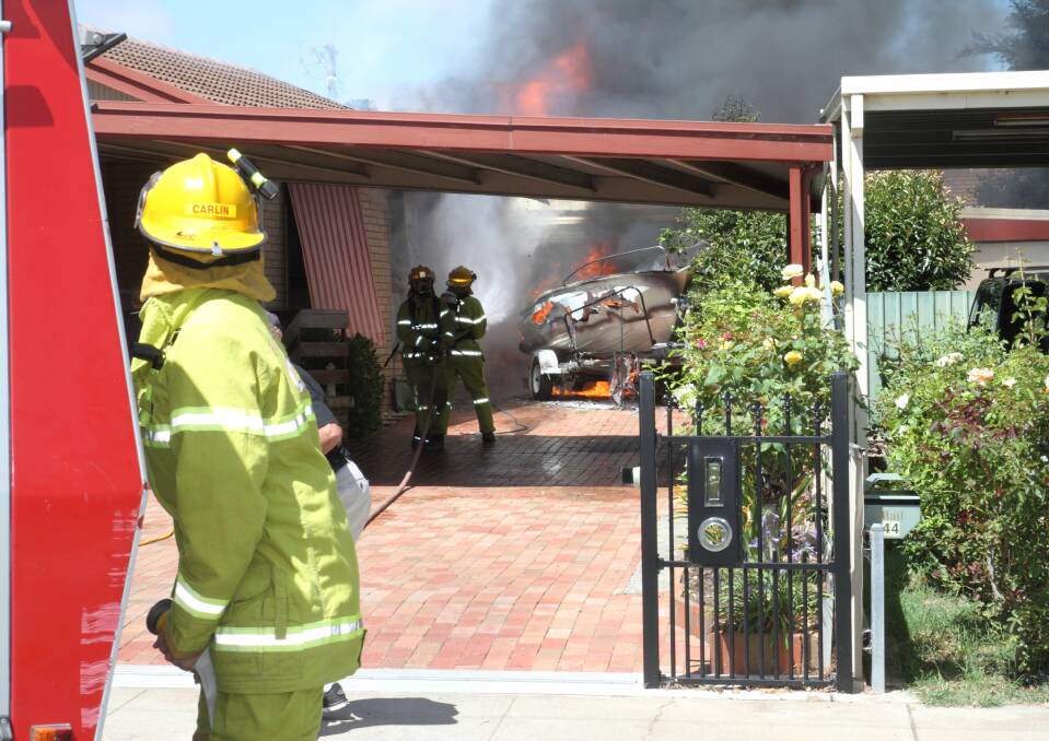 FIRE: A boat catches fire at a Stawell property on Sharpley Avenue. PICTURE: Peter Pickering