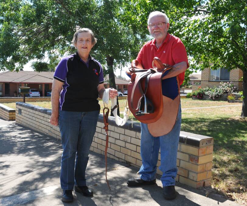 THANKFUL: Stawell Riding for the Disabled coach Margaret Taylor appreciates Pat Browne's handmade horse saddle as a donation to the club. Photo: Anthony Piovesan