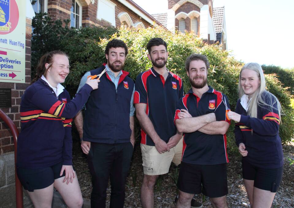 READY: Student Lucy Webster, teachers Jessie Poulton, Jordan Main, Sam Carter and student Georgie Anderson prepare for the World's Greatest Shave. Picture: Peter Pickering 
