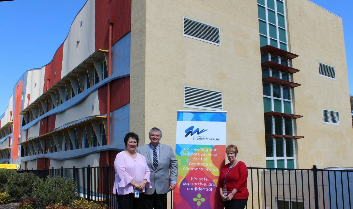 COMMITTED: Grampians Community Health manager Karen Watson, chief executive Greg Little and coordinator Suzan Power in front of the GCH Stawell office. 
