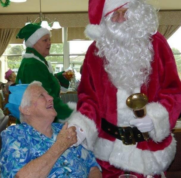 SANTA VISIT: Santa Claus payed a visit to Eventide Homes and treated resident Dawn Scott to an opportunity to make an important Christmas wish. 