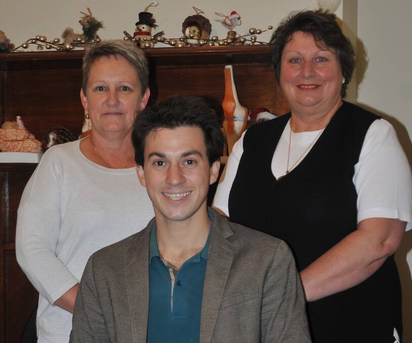 WELCOME: Ararat and Stawell Chiropractic receptionists Shelly Wadge and Carmen MacDonald welcome Dr Tyler Humphris back to Stawell. PICTURE: Anthony Piovesan