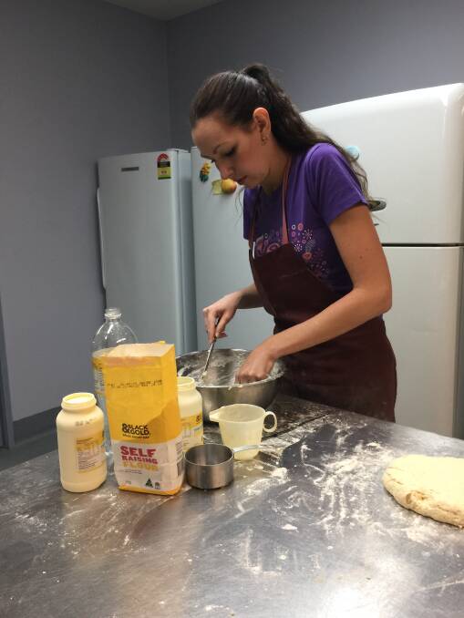 SUPPORT: Jess Cass makes scones as part of the CWA scone drive to raise money and awareness for Crohn's Colitis Australia. 
