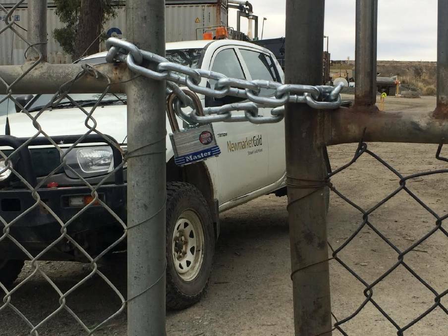 LOCKED OUT: Stawell Gold Mines employees were greeted by security and a locked gate when they turned up to begin work on Tuesday. Photo: Grace Bibby