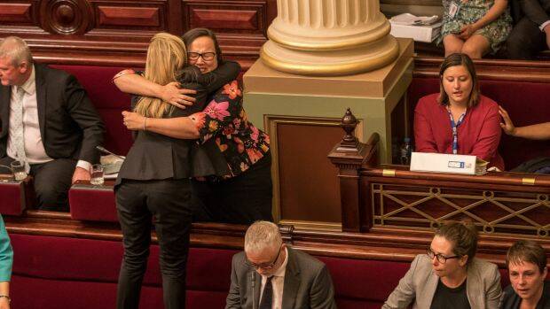 Emotional scenes in the Victorian upper house after the euthanasia bill passes. Photo: Jason South