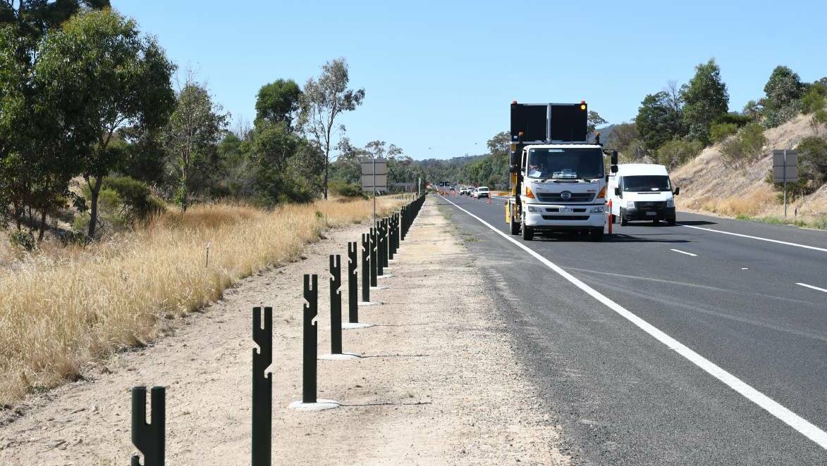 More wire rope barriers are being installed on the Calder Highway from Bendigo to the Western Ring Road. The roads minister says opponents are "playing conspiracy theories". Picture: ADAM HOLMES