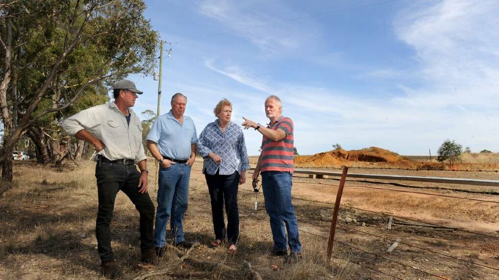 Kanagulk Landcare Group members Ian Ross, Philip and Elizabeth Costello and Albert Miller discuss concerns about Iluka Resources' mining operations in the region during a tour of affected properties at Kanagulk. Picture: SAMANTHA CAMARRI