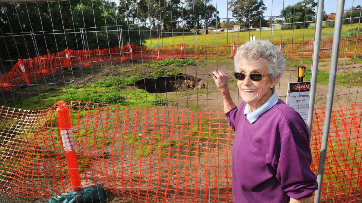 BIG HOLE: Norma McIntyre, 91, has a collapsed mine shaft behind her home.