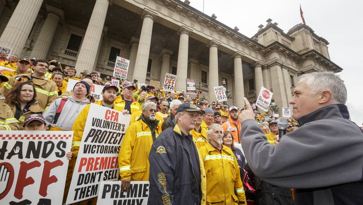 Prime Minister Malcolm Turnbull makes an appearance at the CFA Volunteer and Supporters Rally, Treasury Gardens, Sunday 5th June 2016. Photo: Daniel Pockett
